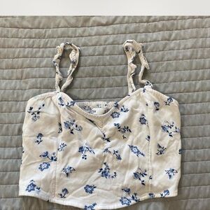 FREE WITH BUNDLE 

Hollister Blue and White Floral Camisole FREE WITH BUNDLE